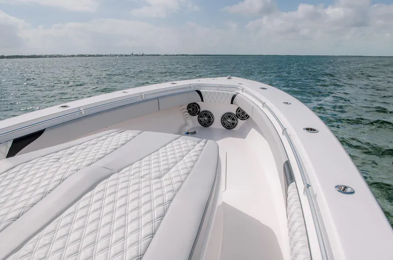 Slide: The Image of 2025 Contender 39 Fisharound boat with luxurious seating on open water. - 22