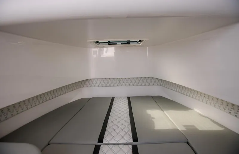 Slide: The Image of Interior cabin of 2025 Contender 39 Fisharound boat with cushioned seating. - 28