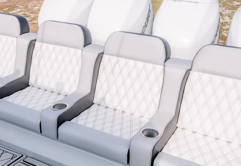 Slide: The Image of Luxury seating on the 2025 Contender 39 Fisharound boat with diamond-stitched upholstery. - 37