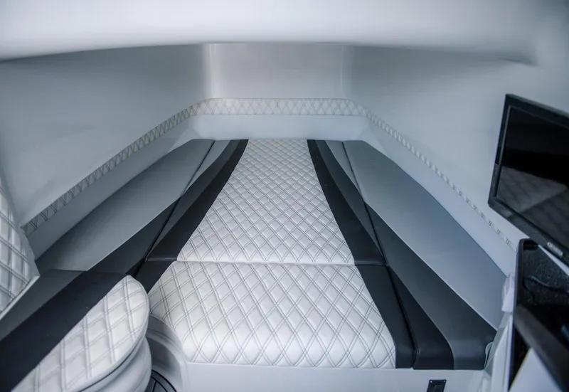 Slide: The Image of Interior cabin of 2025 Contender 39 Fisharound with quilted seating and modern design. - 7