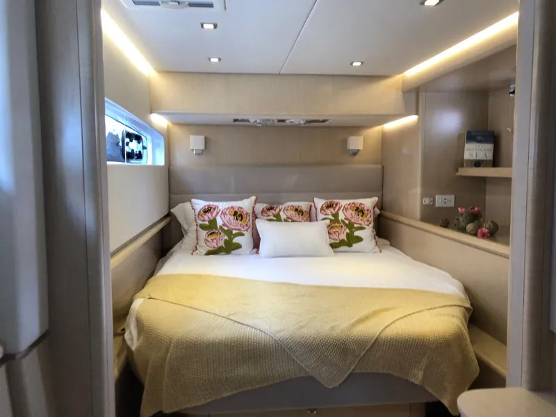 Slide: The Image of Luxurious Seawind 1600 2025 yacht cabin with cozy bed and elegant decor. - 3