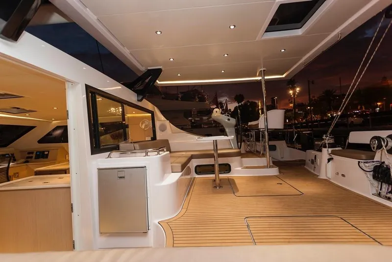 Slide: The Image of Luxurious Seawind 1600 yacht interior, 2025 model, featuring elegant wood flooring and modern amenities. - 37