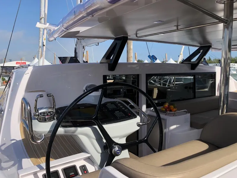 Slide: The Image of 2025 Seawind 1600 yacht cockpit with modern steering and comfortable seating. - 6