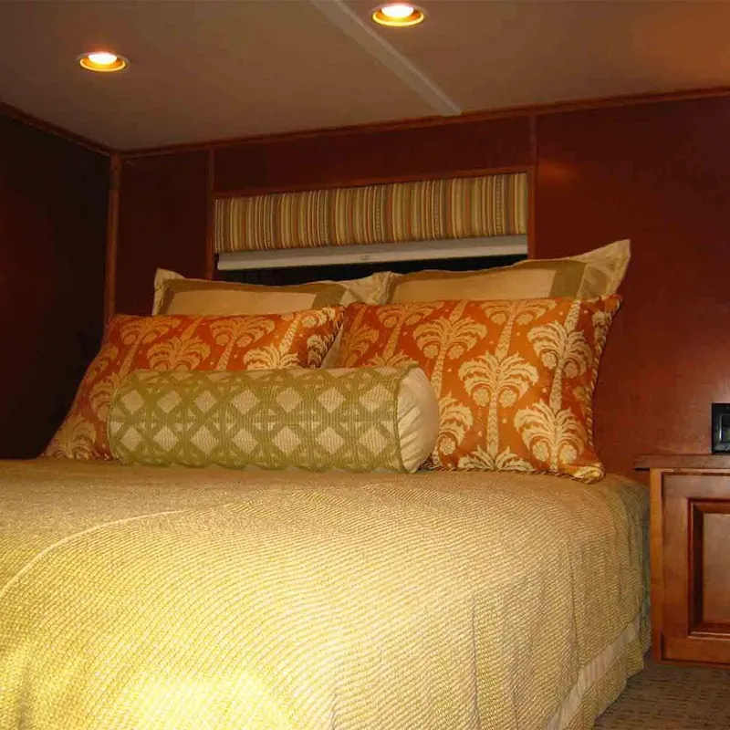 Slide: The Image of Luxurious bedroom interior in 2011 Bravada Dreamweaver Trip #2 with elegant bedding. - 6