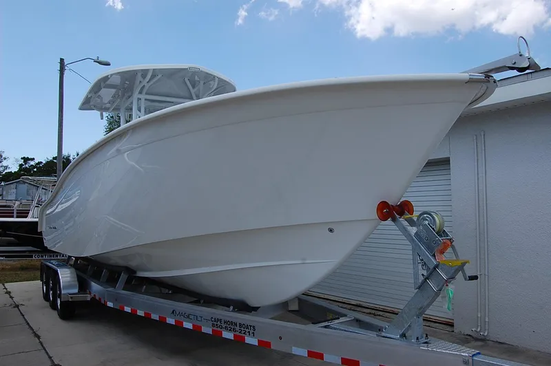 The Image of 2025 Cape Horn 32 XS boat on a trailer, side view. - 0