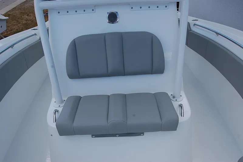 Slide: The Image of 2025 Cape Horn 32 XS boat with gray cushioned seating. - 19