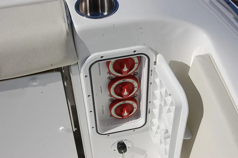 Slide: The Image of Battery switches on a 2025 Cape Horn 32 XS boat. - 2