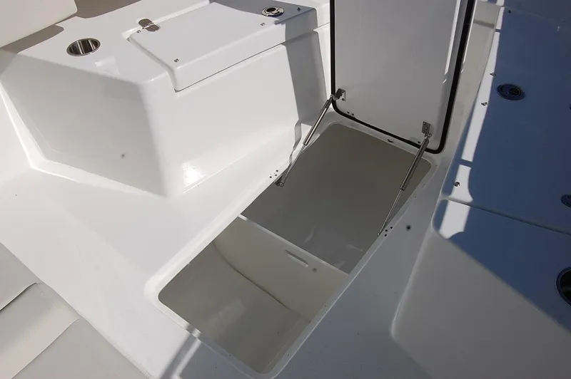 Slide: The Image of 2025 Cape Horn 32 XS boat storage compartment and seating area. - 11