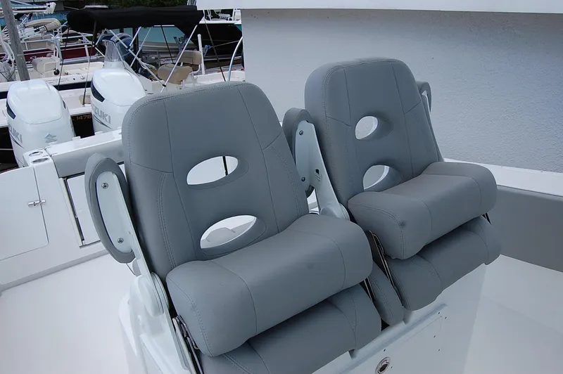 Slide: The Image of 2025 Cape Horn 32 XS boat with dual grey cushioned seats. - 20