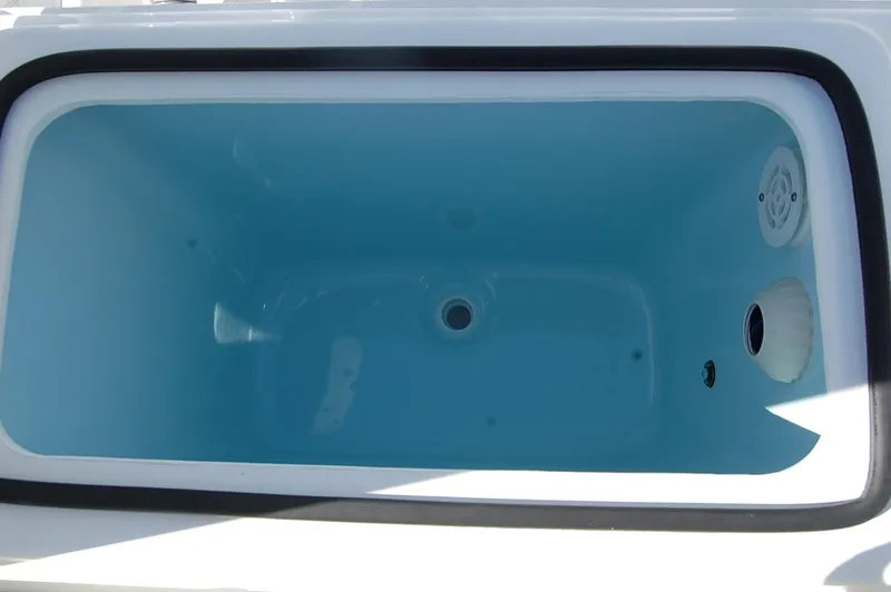 Slide: The Image of 2025 Cape Horn 32 XS boat livewell, empty and clean. - 4