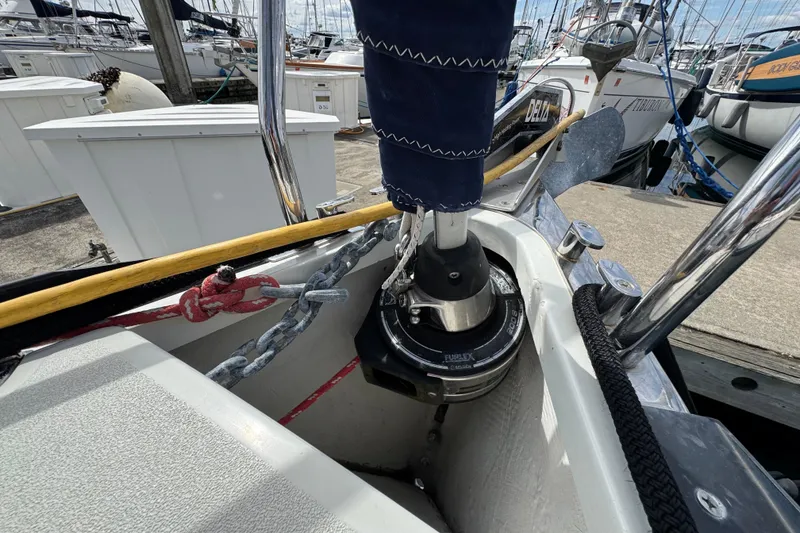 Slide: The Image of Sailboat deck with rigging and anchor chain, C&C 110, 2004 model, docked at marina. - 7