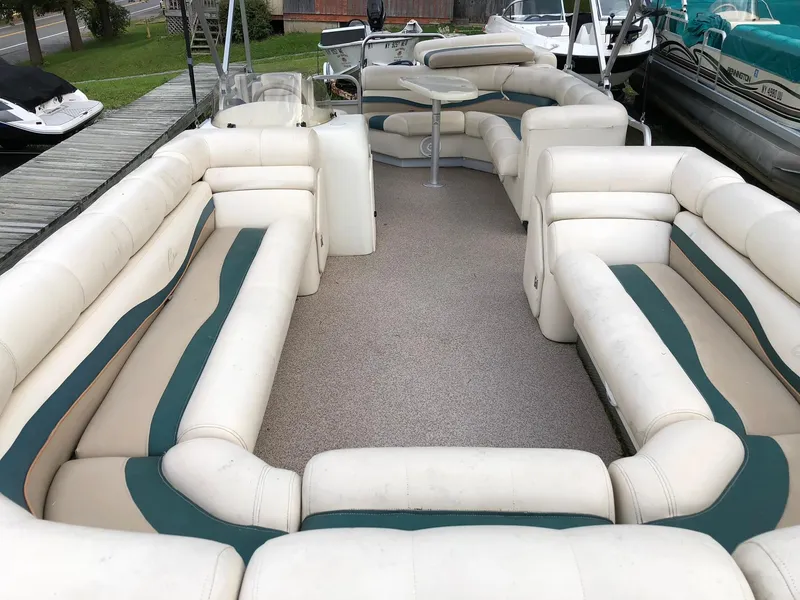 Slide: The Image of 2001 Bennington 2250 RL pontoon boat with spacious seating and table. - 3