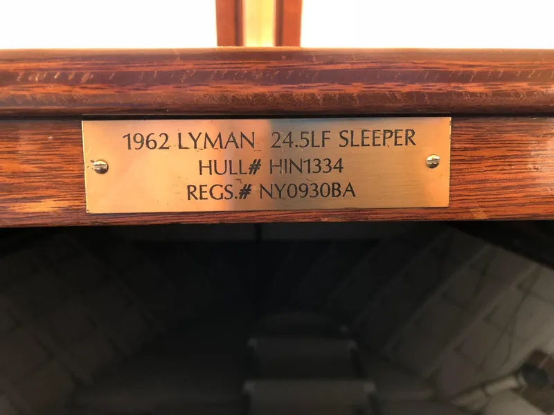Slide: The Image of Plaque on 1962 Lyman 24.5LF Sleeper boat with hull and registration numbers. - 11
