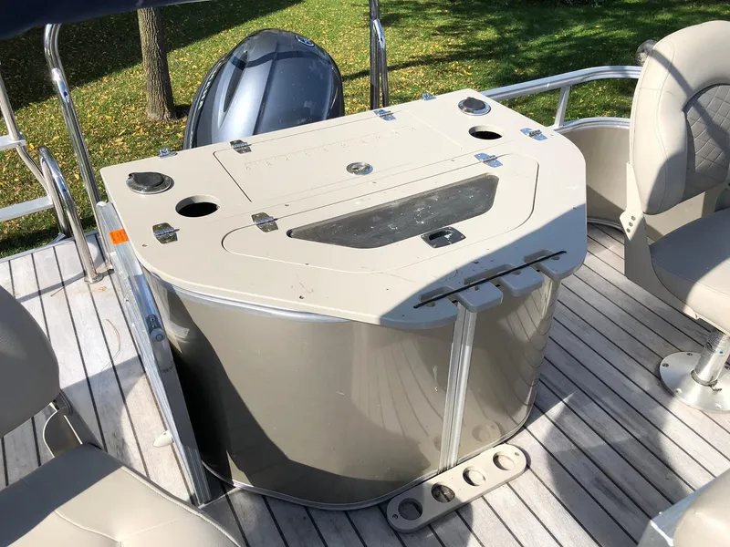 Slide: The Image of 2015 South Bay 522 FCR boat interior with seating and control console. - 11