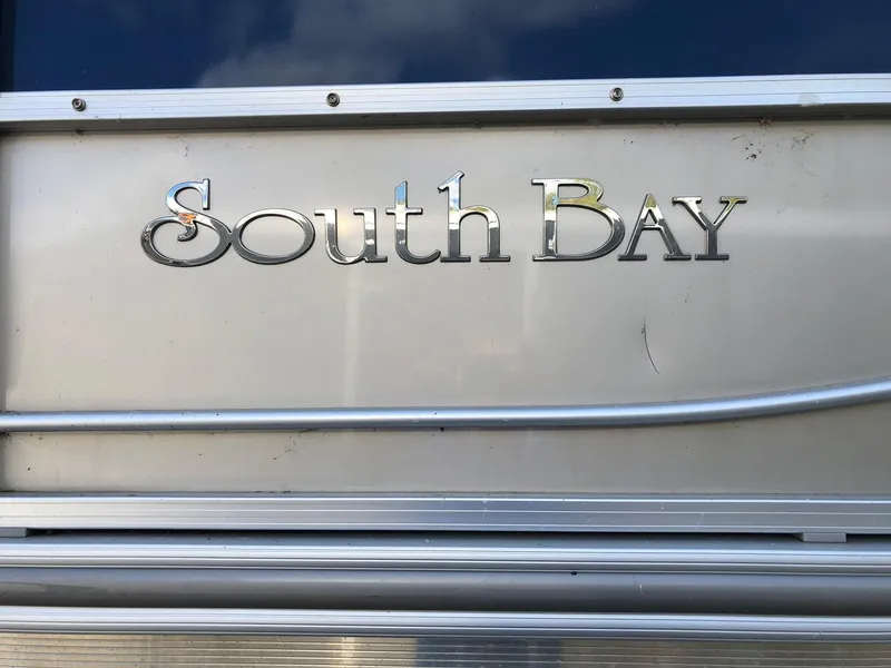 Slide: The Image of 2015 South Bay 522 FCR logo on metallic surface. - 14