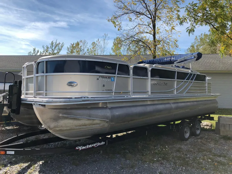 Slide: The Image of 2015 South Bay 522 FCR pontoon boat on trailer, parked outdoors. - 3
