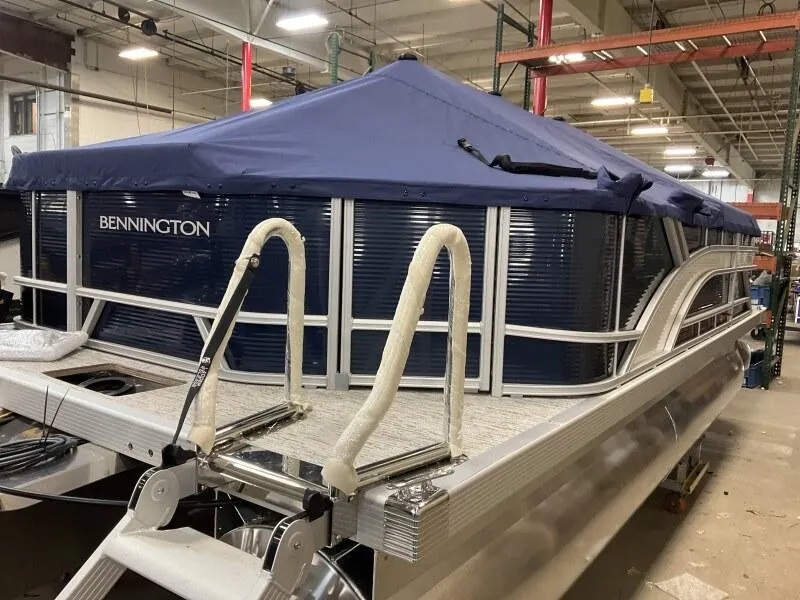 Slide: The Image of 2025 Bennington 20 SL Family pontoon with privacy room, blue cover, in stock. - 16