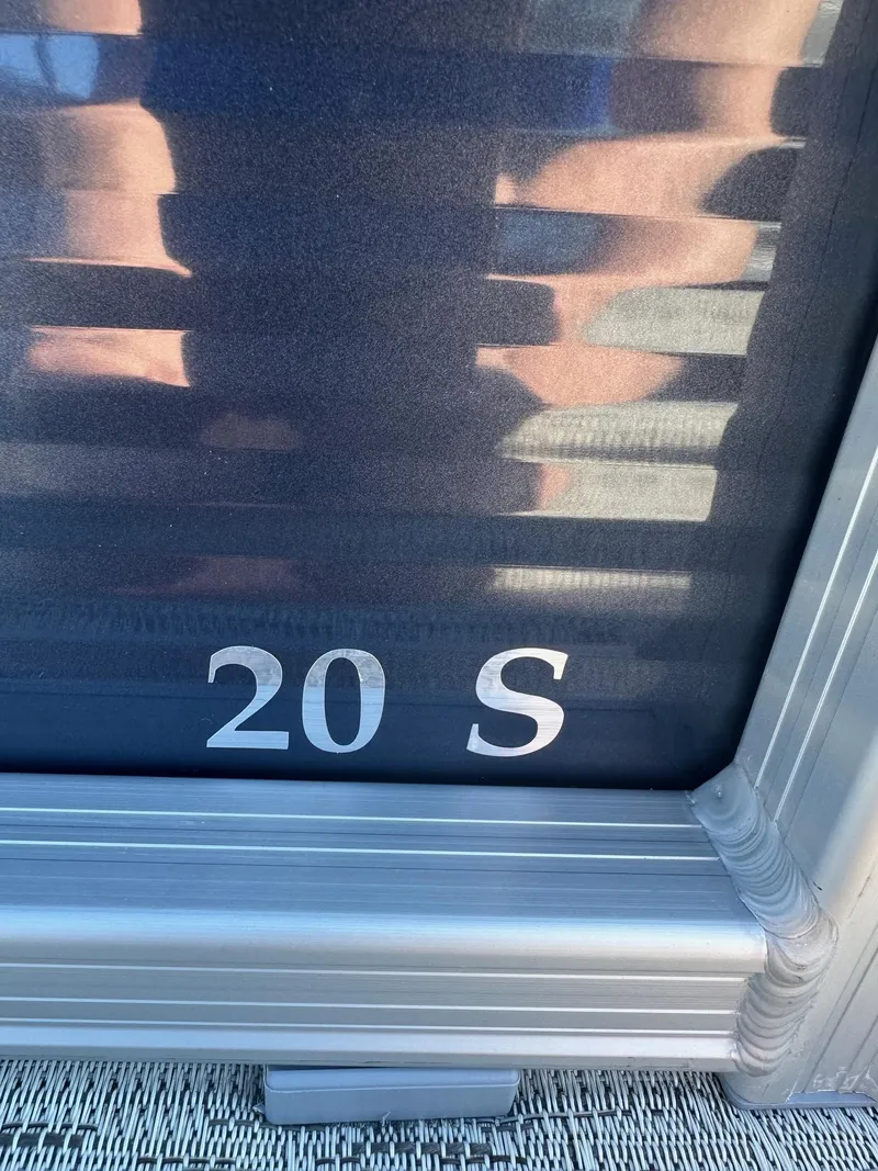 Slide: The Image of Close-up of Bennington 20 SL Family model with privacy room, 2025 edition. - 3