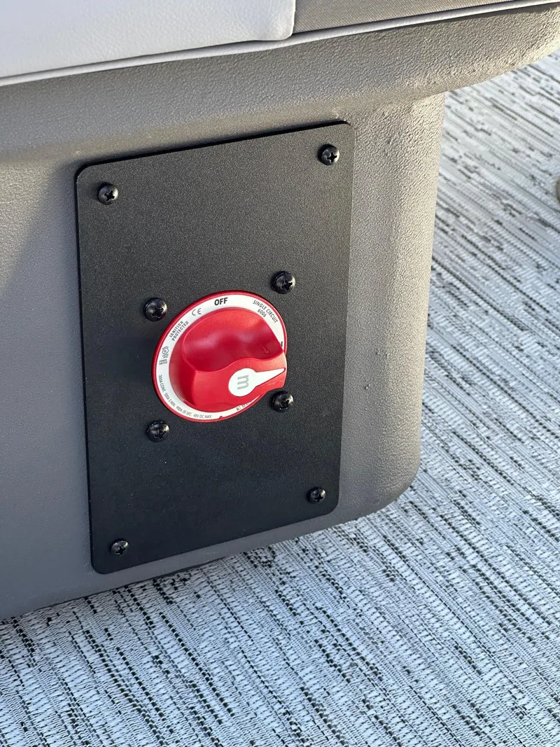 Slide: The Image of Red power switch on 2025 Bennington 20 SL Family boat. - 35