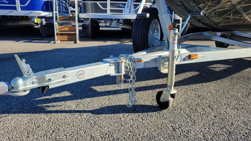 Slide: The Image of Trailer hitch of 2025 Smoker Craft Sportsman 1660, Mossy Oak Camo, on pavement. - 4