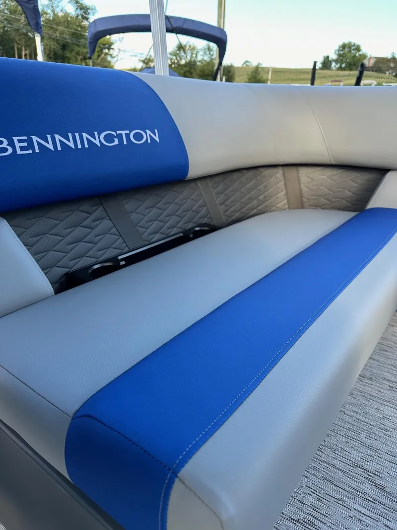 Slide: The Image of 2025 Bennington 21 SSR Quad Bench, blue and gray seating detail, in stock. - 10