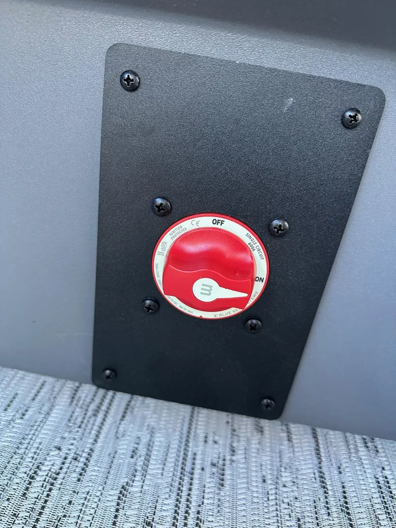 Slide: The Image of Red power switch on 2025 Bennington 21 SSR Quad Bench boat. - 11