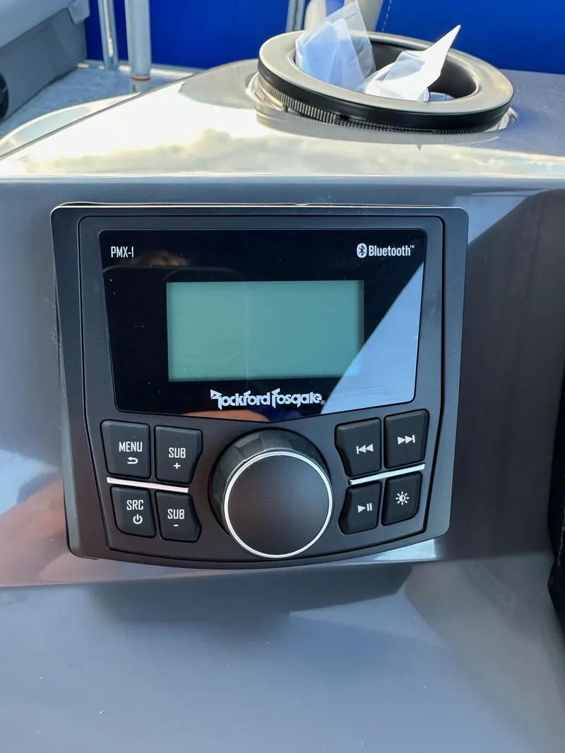Slide: The Image of Rockford Fosgate PMX-1 Bluetooth stereo on 2025 Bennington 21 SSR Quad Bench. - 21