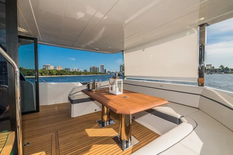 Slide: The Image of Luxurious deck of the 2023 Galeon 680 Fly yacht with waterfront view. - 20