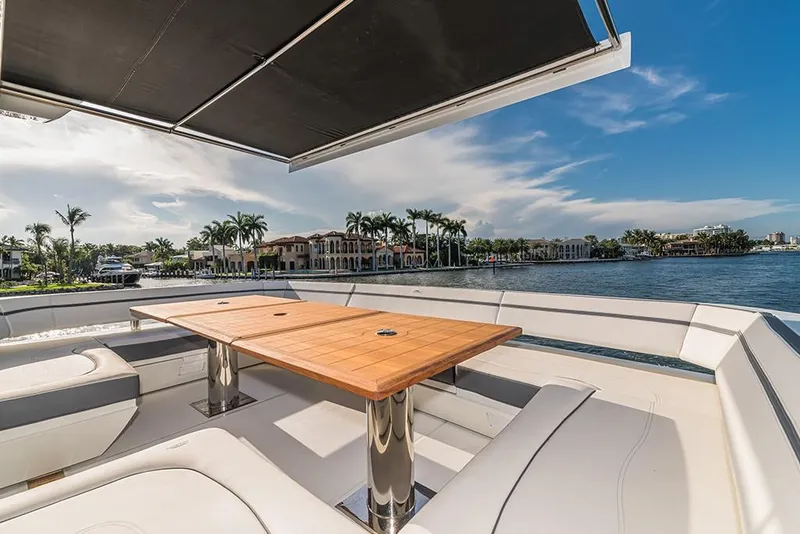 Slide: The Image of Luxury seating area on 2023 Galeon 680 Fly yacht with waterfront view. - 25