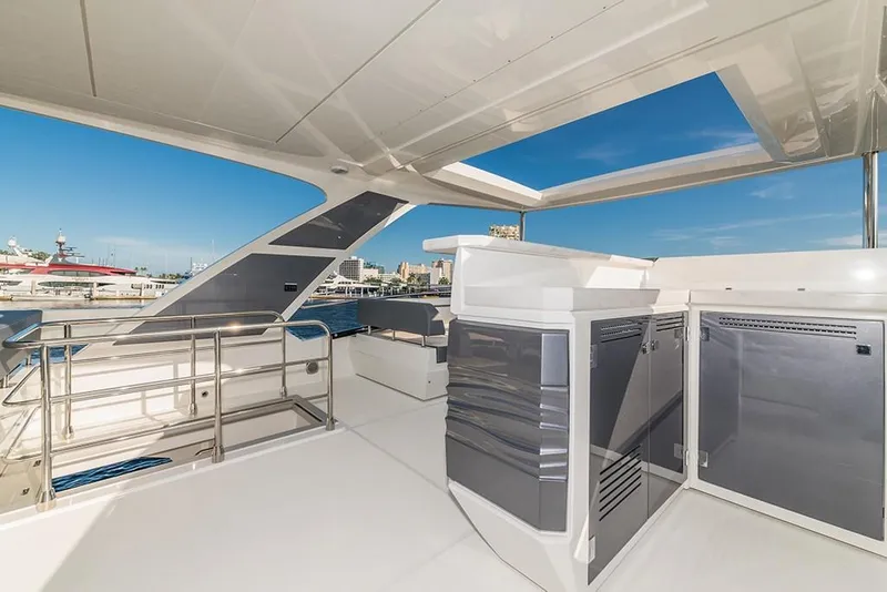 Slide: The Image of Flybridge of 2023 Galeon 680 Fly yacht with modern amenities and ocean view. - 34