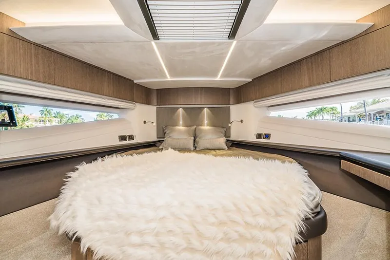 Slide: The Image of Luxurious bedroom interior of 2023 Galeon 680 Fly yacht with plush bedding and modern design. - 43