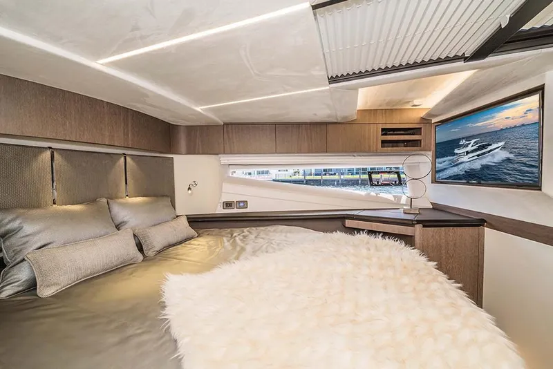 Slide: The Image of Luxurious bedroom interior of 2023 Galeon 680 Fly yacht with modern decor and large window. - 44