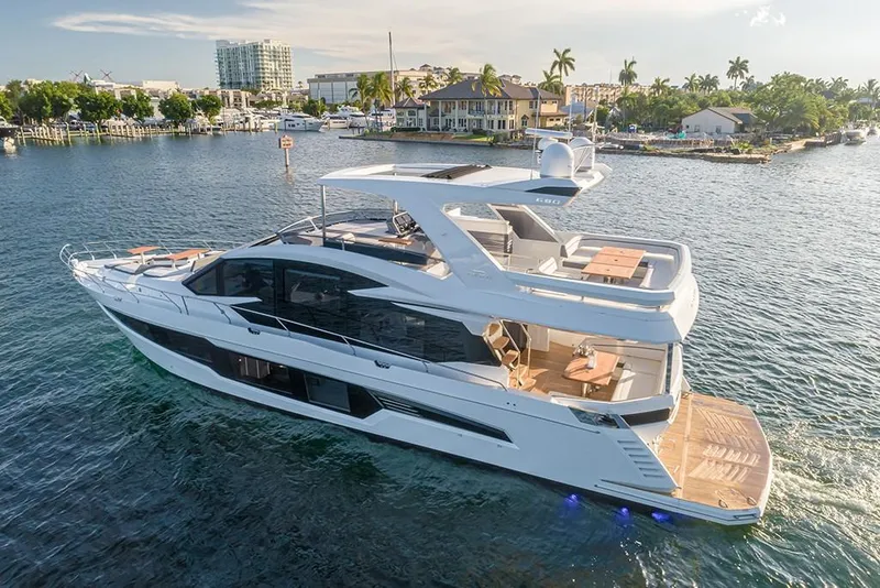 Slide: The Image of 2023 Galeon 680 Fly luxury yacht cruising on a sunny day. - 5