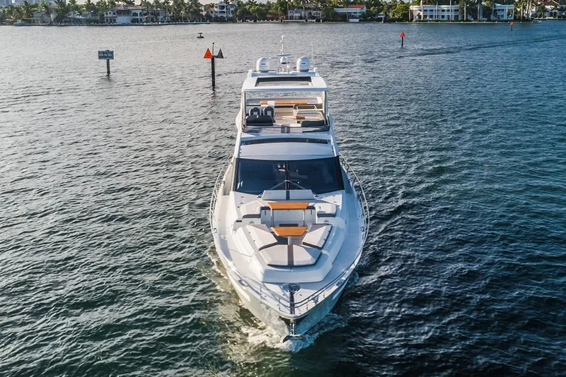 Slide: The Image of 2023 Galeon 680 Fly luxury yacht cruising on open water. - 6