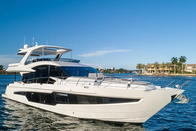Slide: The Image of 2023 Galeon 680 Fly luxury yacht cruising on a sunny day. - 8
