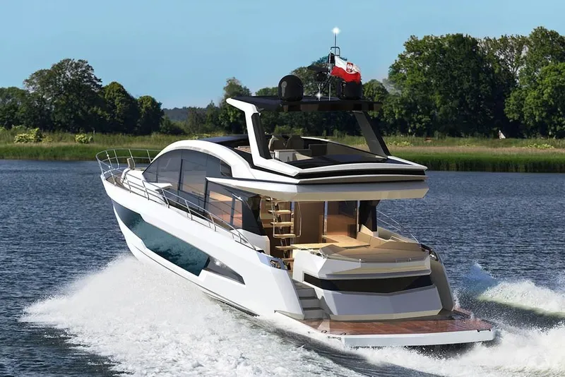 Slide: The Image of 2023 Galeon 700 Sky yacht cruising on a lake. - 2