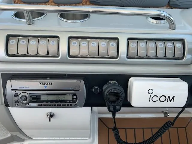 Slide: The Image of Control panel of a 2009 Formula 45 Yacht with Kenwood stereo and Icom radio. - 17