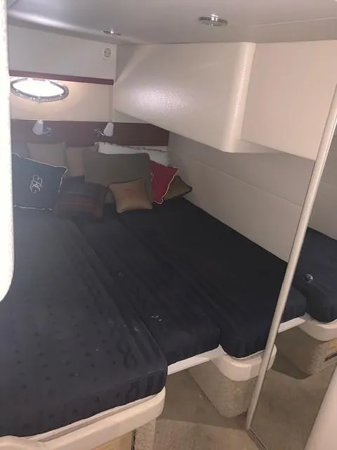 Slide: The Image of 2009 Formula 45 Yacht interior cabin with cozy bedding and cushions. - 26