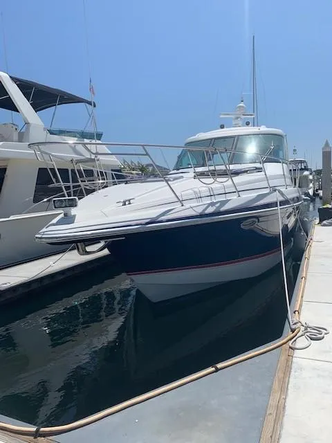 Slide: The Image of 2009 Formula 45 Yacht docked in marina under clear blue sky. - 3