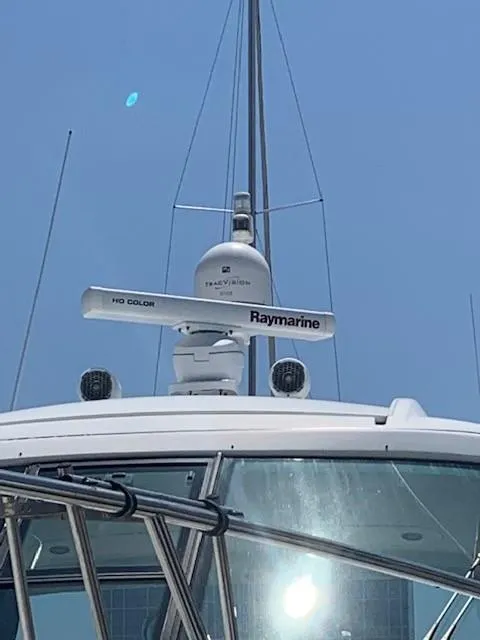 Slide: The Image of 2009 Formula 45 Yacht with Raymarine radar system under clear blue sky. - 7