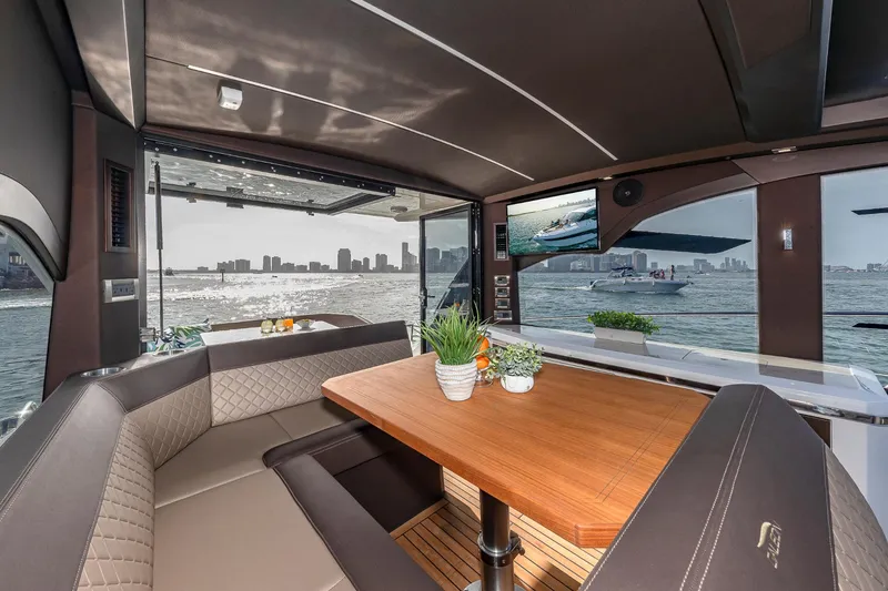 Slide: The Image of Interior of 2023 Galeon 425 HTS yacht with city skyline view. - 10