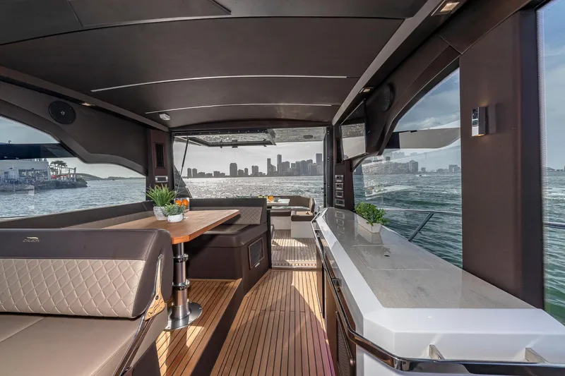 Slide: The Image of Interior of 2023 Galeon 425 HTS yacht with city skyline view. - 11