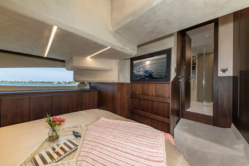 Slide: The Image of Luxurious interior of 2023 Galeon 425 HTS yacht with modern decor and scenic window view. - 21