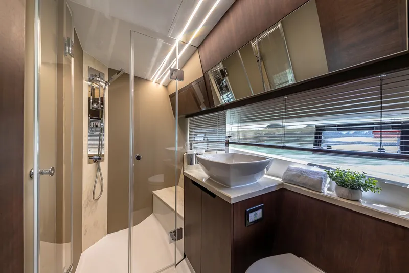 Slide: The Image of Luxurious bathroom interior of 2023 Galeon 425 HTS yacht with modern fixtures and glass shower. - 22