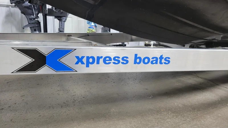 Slide: The Image of Xpress Boats trailer for 2025 X21 Pro Bass with Yamaha Vmax 250. - 12