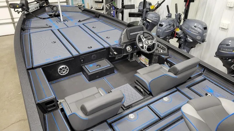 Slide: The Image of 2025 Xpress X21 Pro Bass boat interior with Yamaha Vmax 250 engine, featuring modern seating and controls. - 5