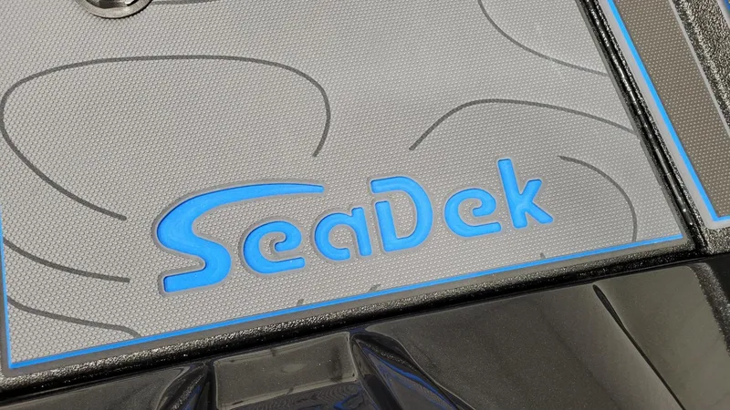 Slide: The Image of SeaDek logo on Xpress X21 Pro Bass boat, 2025 model, featuring Yamaha Vmax 250. - 7