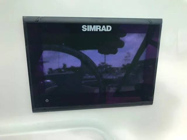 Slide: The Image of Simrad display on 2019 NauticStar 2302 LDC boat dashboard. - 21