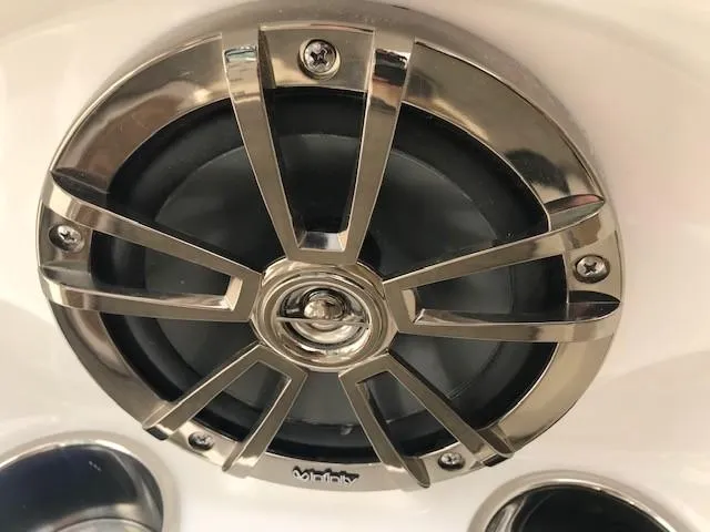 Slide: The Image of Close-up of a 2019 NauticStar 2302 LDC boat speaker with metallic grille. - 23