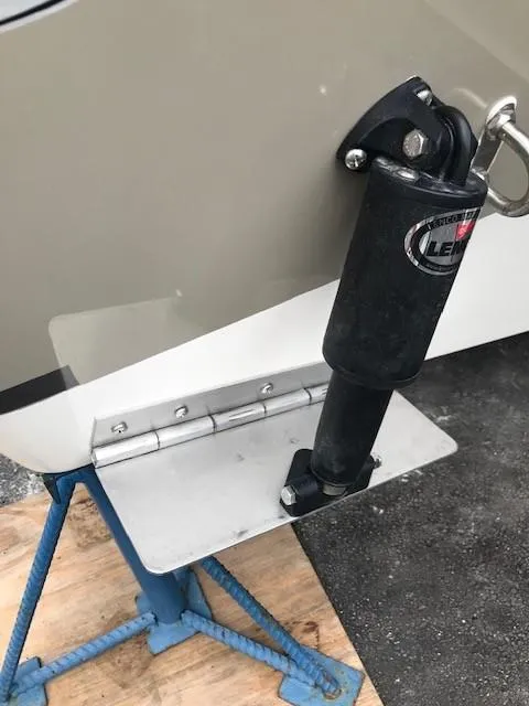 Slide: The Image of 2019 NauticStar 2302 LDC boat trim tab and actuator detail. - 42